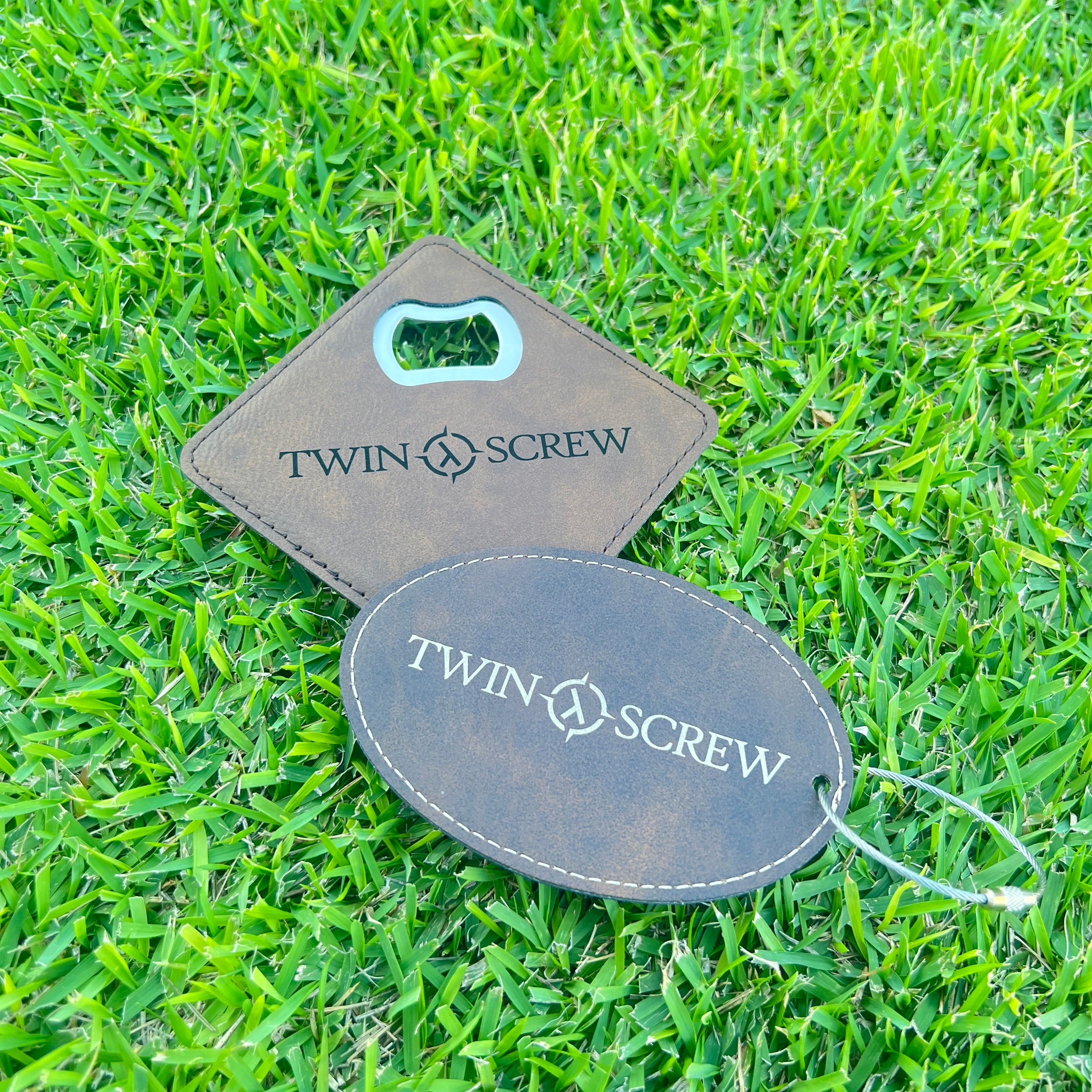 Tug bag tag or bottle opener